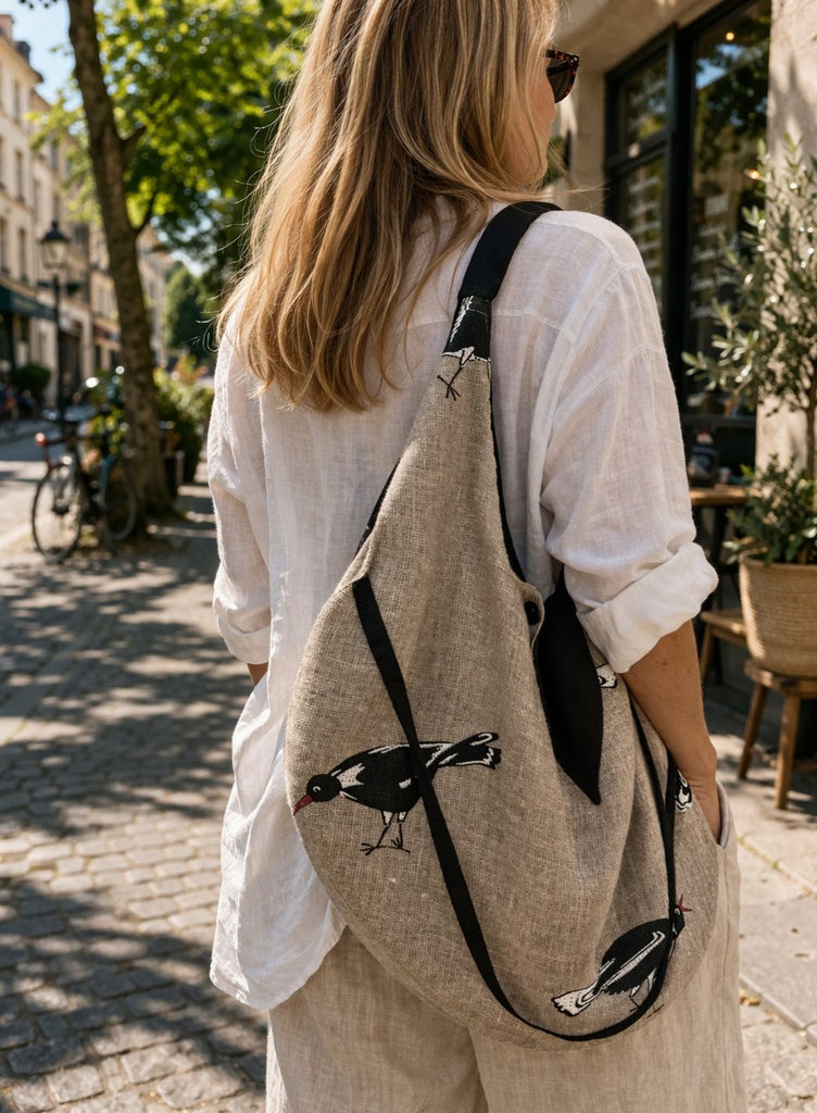 Soft linen hobo bag with unique bird print, lightweight shoulder tote with magnetic snap and zippered inner pocket, sustainable everyday bag